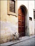 buidling in Florence, Italy with a bike