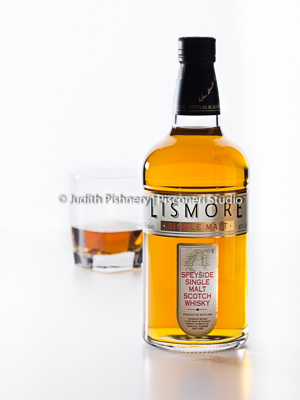 bottle of lismore liquor with glass