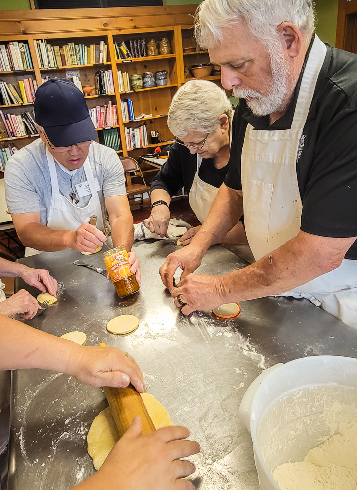workshop students making pasta