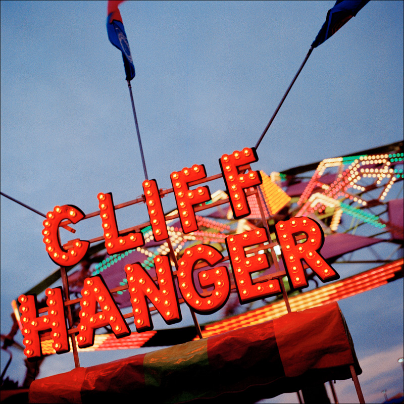 at the fair, carnival ride, cliff hanger