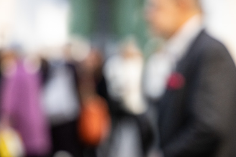 students listening to a curator in a gallery