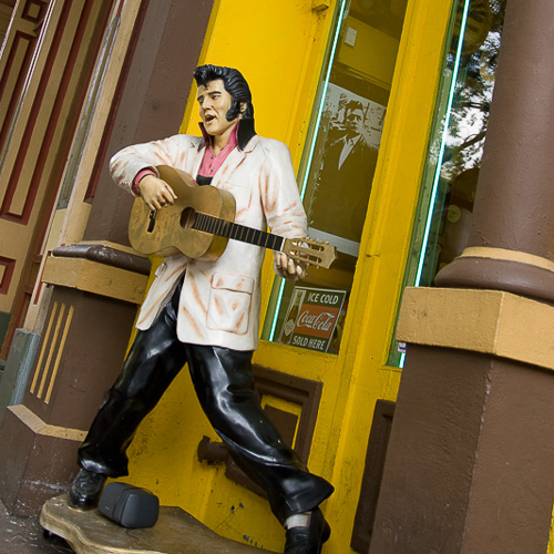 Elvis playing guitar statue